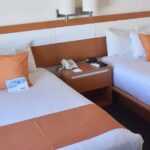Recámara de hotel.